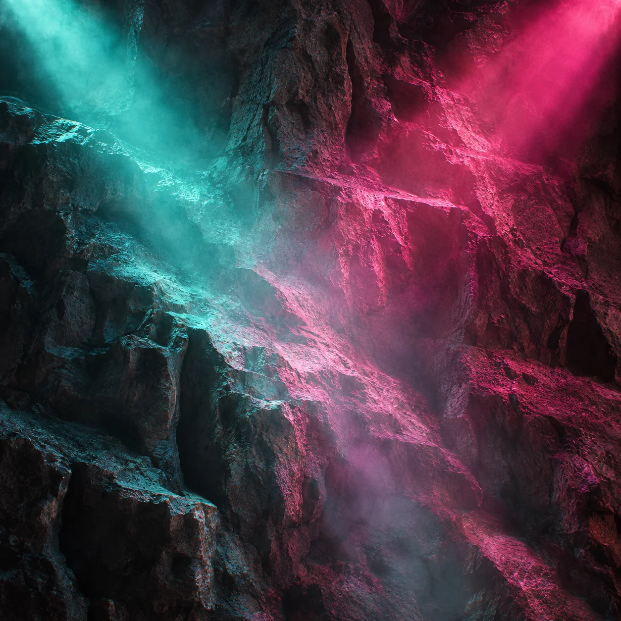 Haces de luz verde y magenta sobre las paredes de La Cova de noche